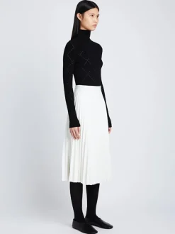 Daphne Faux Leather Pleated Skirt in Off White